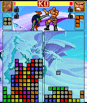 Super Fighter Block Battle | Onimaru kicks Sarkov after clearing a line of blocks.